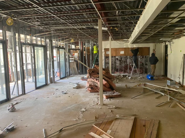 Moldmen NJ mold men nj staff working on remediating mold from a building the drywall is ripped out the framing is exposed 640x480